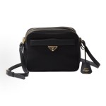 PRADA women\'s black crossbody single-shoulder bag with an enamel metal triangular logo on the front